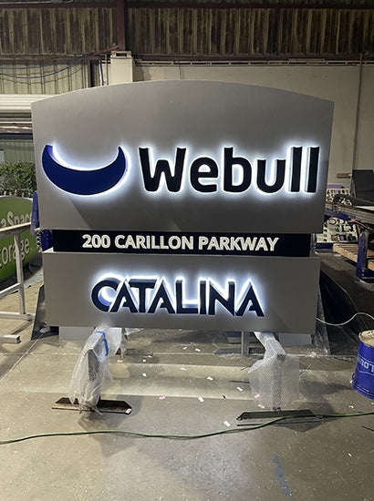 Webull Catalina sign in a warehouse setting