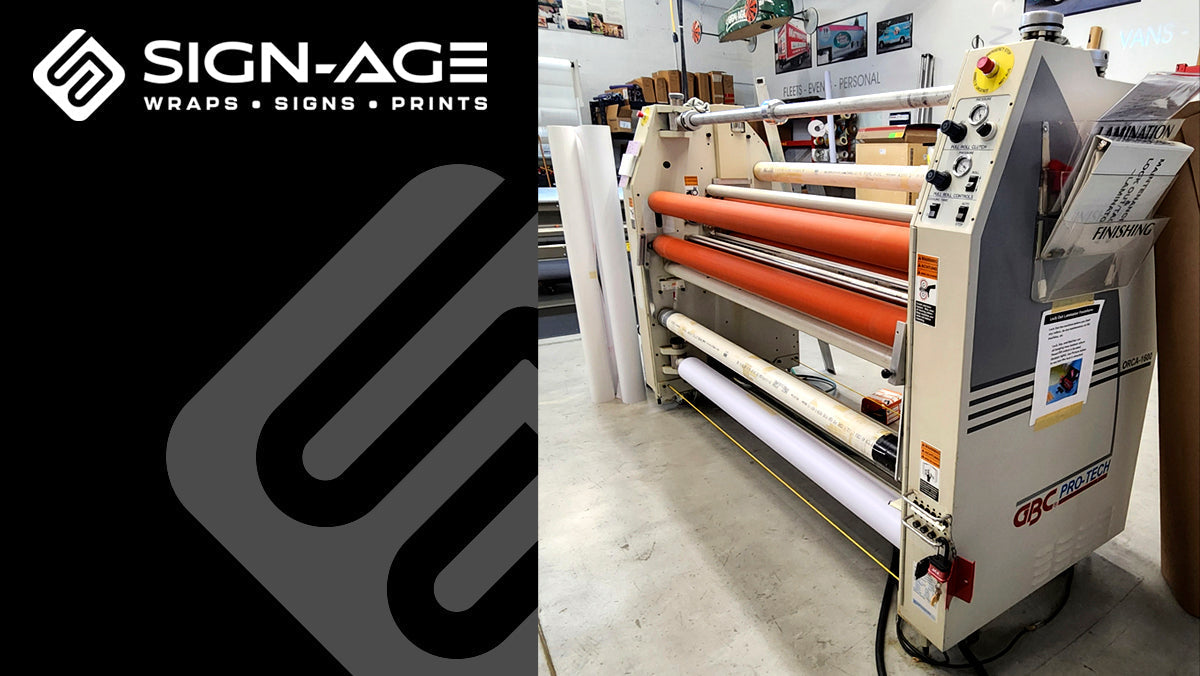 The old Sign-Age laminator on the right, with the Sign-Age logo and graphic element on a black background on left.
