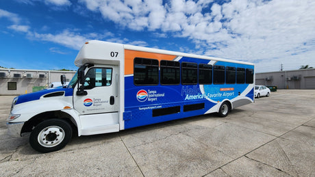 Sign-Age Delivers again! Tampa International Airport Shuttle Bus Wraps - Sign-Age