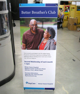 Promotional banner for 'Better Breather's Club' at a hospital entrance.