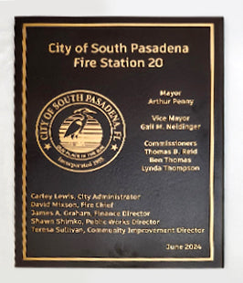 Engraved plaque from the City of South Pasadena Fire Station 20 with names and positions listed.