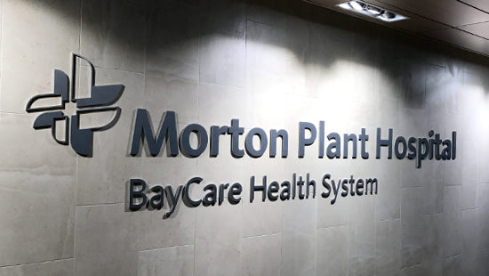 Morton Plant Hospital dimensional interior sign on a wall with BayCare Health System branding.