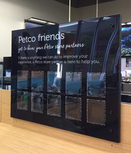 Petco store interior with a feedback sign for customers.