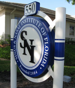 Post and panel sign for the Sinus & Nasal Institute of Florida with a blue and white design.