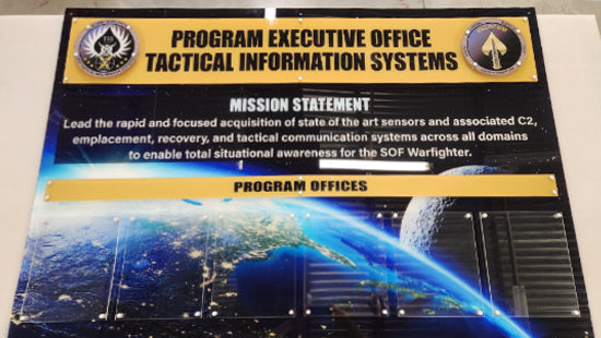 Program Executive Office Tactical Information Systems sign with mission statement and program offices text.